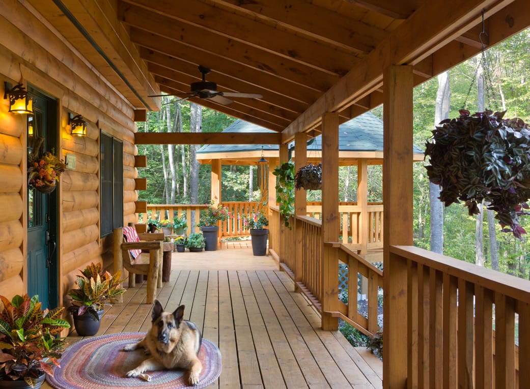 adirondack style porch Deck - Coventry Log Homes